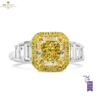 White Gold Radiant Cut Fancy Yellow Diamond & Tapered Cut Diamond Ring - 3.14ct