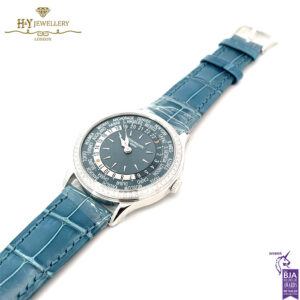 Patek Philippe World Time White Gold Diamond Bezel - ref 7130G-016-17646